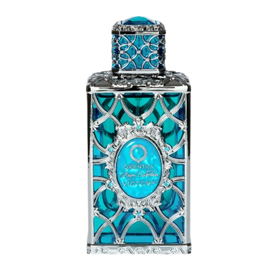 Decorative blue perfume bottle with intricate design on a white background