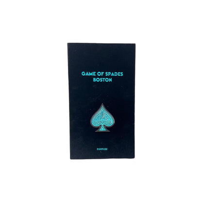 Black perfume bottle with blue design and text on a white background