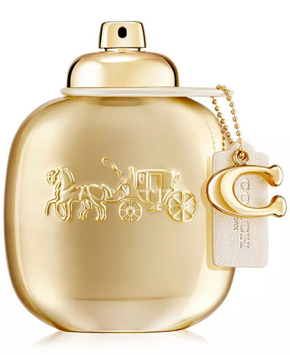 Gold perfume bottle with horse and carriage design and Coach logo on a white background