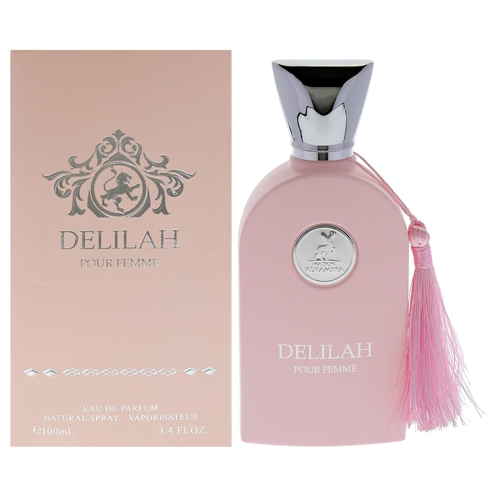 Pink Delilah perfume bottle with tassel and packaging on a white background