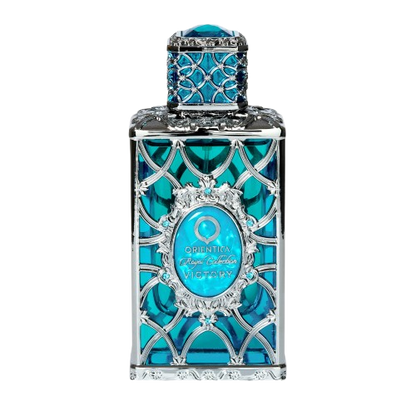 Decorative blue perfume bottle with intricate design on a white background