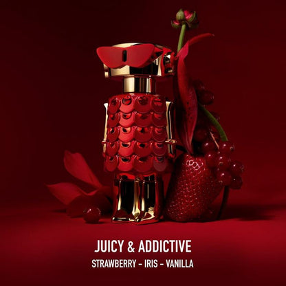 Red and gold perfume bottle with strawberry and flower on a red background, labeled 'Juicy & Addictive'.