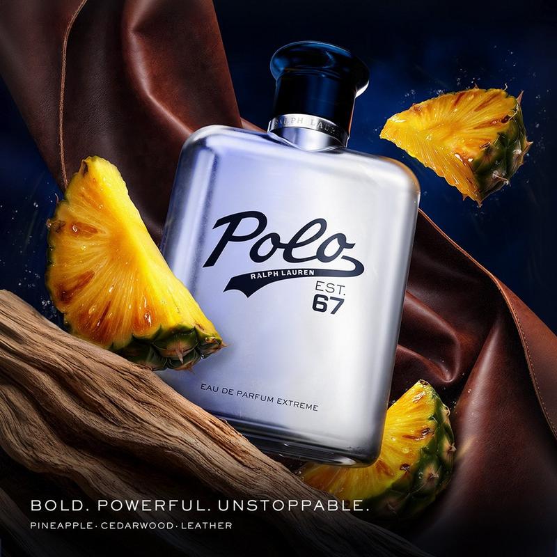 Polo Ralph Lauren perfume bottle with pineapple slices on a dark background