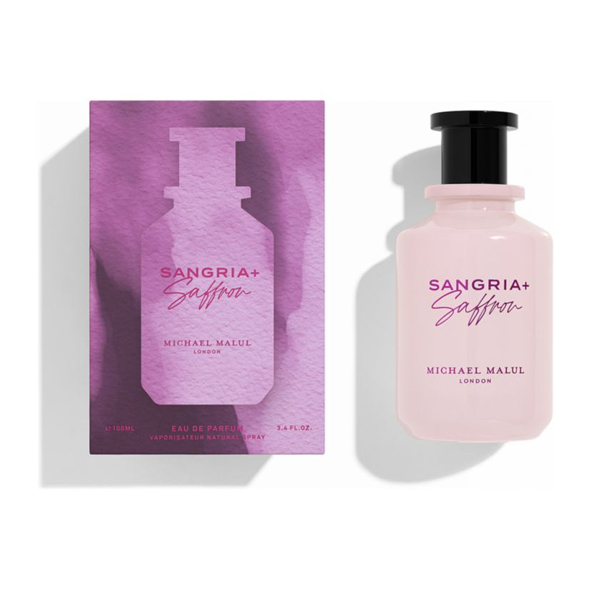 Pink perfume bottle and packaging with 'Sangria + Saffron' text on a white background