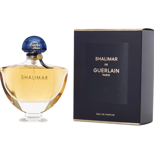 Shalimar de Guerlain perfume bottle and packaging on a white background